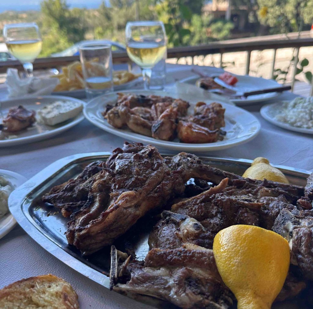 Typical Greek food meat wine