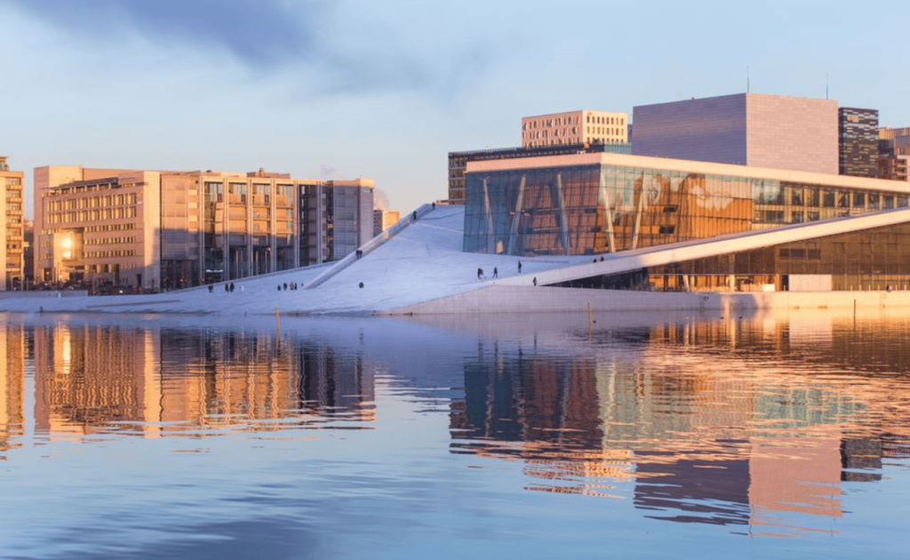 Modern architecture reflecting on water.